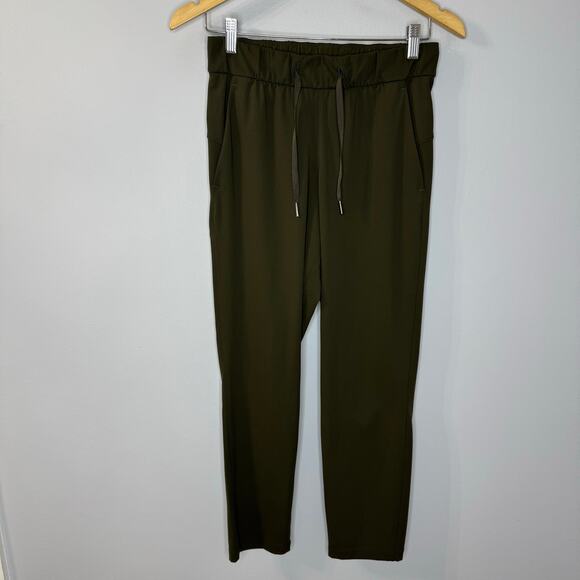 Lululemon On the Fly 7/8 Pant Drawstring Woven Dark Olive Women's 4 - Picture 2 of 11